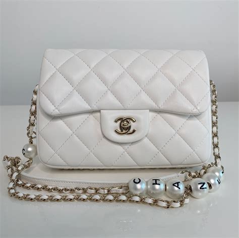 chanel handbags with pearls on strap|Chanel pearl bag price.